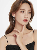 Load image into Gallery viewer, Silver Bow Cascade Earrings