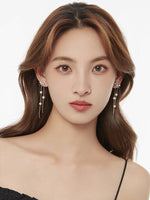 Load image into Gallery viewer, Silver Bow Cascade Earrings